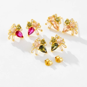 Detailed view of S925 silver stud earrings with colorful teardrop zircon in gold finish