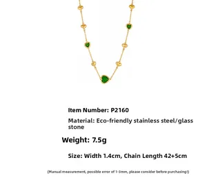 Detail showing 1.4cm green glass stone heart pendant on a 42+5cm gold stainless steel chain