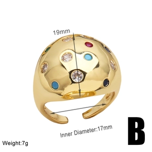 Detail of gold dome ring with colorful zircon inlays showing 17mm inner diameter