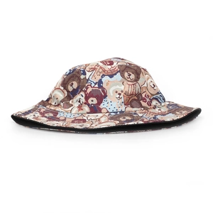 Close-up of jacquard fabric texture and colorful bear patterns on the bucket hat