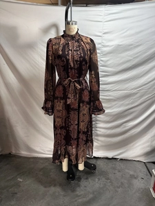 Detailed view of bohemian burgundy paisley chiffon maxi dress with ruffled collar and cuffs