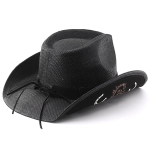 Detail of black straw cowboy hat with patterned brim lining and decorative ribbon