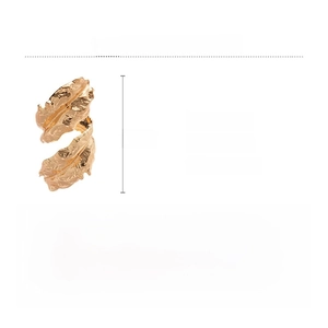 Detail view of golden leaf arm cuff showing natural leaf vein texture and dimensions
