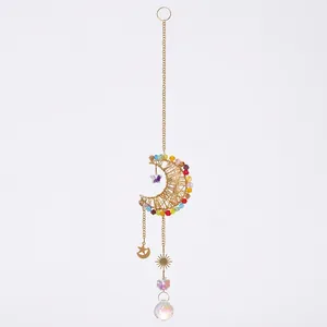 Golden moon suncatcher with colorful crystal beads and a large faceted prism ball