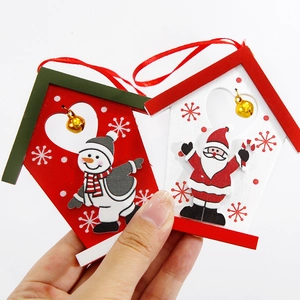 Christmas wooden cabin ornaments with Santa Claus, snowmen and bells for tree decoration