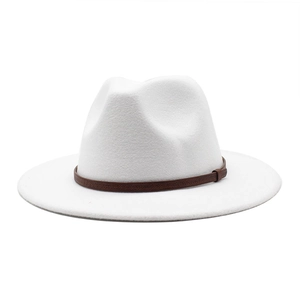 Detailed view of a white wool fedora hat featuring a brown patterned decorative band