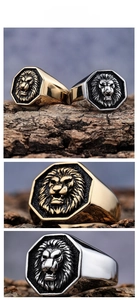 Macro detail of vintage gold and silver stainless steel lion head rings on wood