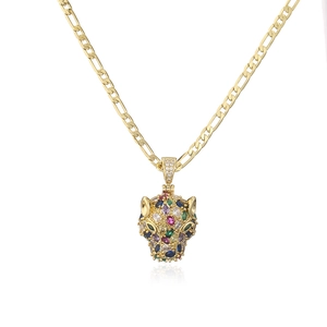 Close-up of 18K gold plated leopard head pendant with colorful cubic zirconia stones
