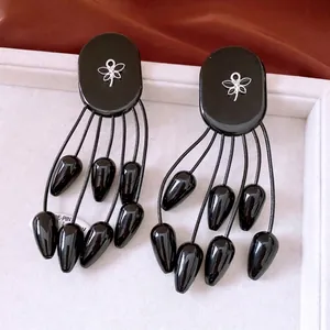 Boucles d'oreilles pompons ovales ethniques en bois avec tige S925 et charme libellule