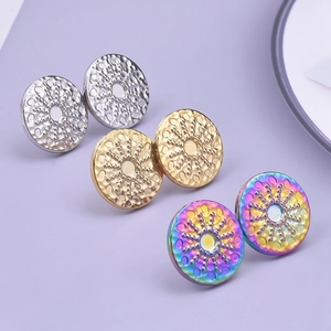 Three pairs of textured round stud earrings in silver, gold and rainbow stainless steel