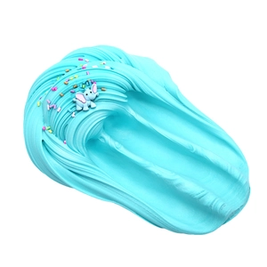 Sky blue butter slime detail with elephant charm and colorful sprinkles texture