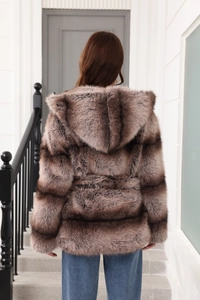Detail view of the hooded faux fur coat back showing gradient brown texture and belt