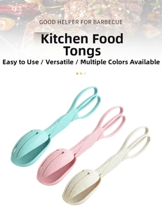 Close-up of three wheat straw food tongs in green, pink and beige for BBQ and salads
