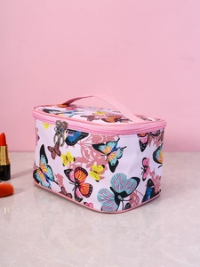 Detail of pink makeup bag featuring colorful butterfly prints and durable zip closure