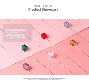 Macro view of multi-color Austrian crystal cube pendants with S925 silver box chain