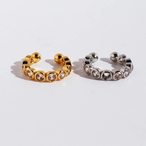 Elegant gold and silver ear cuffs with sparkling white cubic zirconia in a modern style