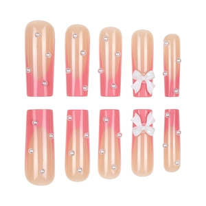 Pink French gradient long coffin press-on nails with 3D bows and pearl accents