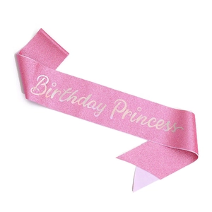 Detail of pink glitter Birthday Princess sash with silver foil lettering for girls