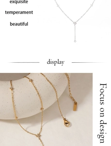 Detailed close-up of exquisite gold and silver Y-shaped necklaces with zircon flowers