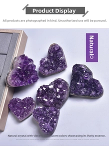 Detailed macro view showing six heart-shaped natural Uruguay amethyst crystal clusters