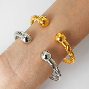 18k gold and silver twisted cable open bangles with smooth ball ends for women