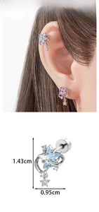 Detail showing the dimensions of the star-shaped earring, 1.43cm height by 0.95cm width