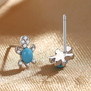 S925 sterling silver turtle stud earrings with blue zircon and pavé diamond details