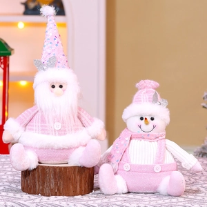 Pink sequin Christmas plush dolls featuring Santa and Snowman on wooden bases