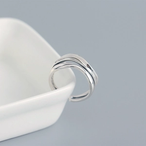 Close-up of S925 sterling silver double-layer ring with irregular textured surface