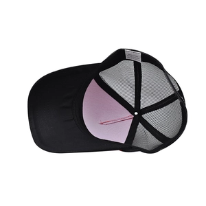 Detail view of cotton mesh baseball hat interior showing fabric label and stitching