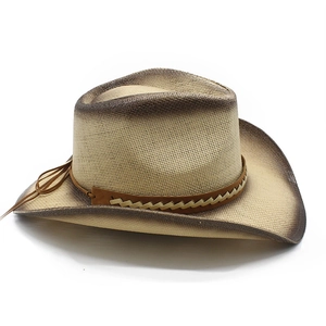 Detail of hand-painted wide brim straw cowboy hat with gradient edges and leather band