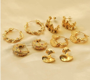 Collection of 18k gold plated textured hoop earrings with sparkling zirconia stones