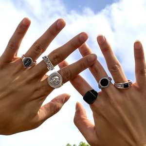Retro punk men's 6-piece silver ring set with skull, black stones, and Revenge engraving