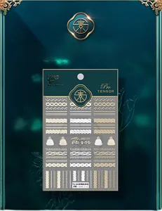 3D relief nail art stickers featuring white knit sweater patterns and tiny hat charms