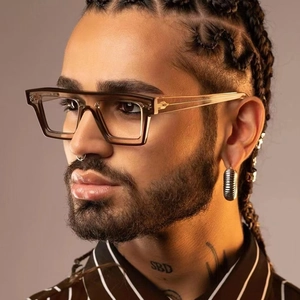 Detail of square amber TR90 frame glasses with double bridge design on male model