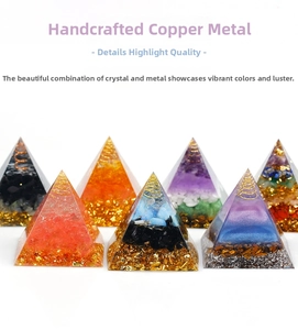 Detailed macro view of handmade Orgone pyramid with copper coil and natural crystals