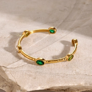 18k gold plated hammered stainless steel open bangle with green and yellow gemstones