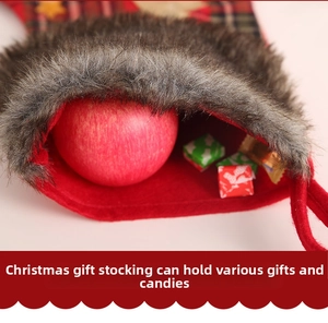 Close-up of a Christmas stocking showing red felt fabric and large capacity for candies