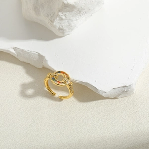 Adjustable 14K gold plated ring with rainbow cubic zirconia and micro-set side stones