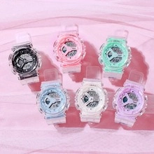 Detailed view of multiple colored transparent sport watches with dual digital display