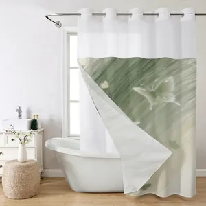 Detail of sage green butterfly print shower curtain with metal rings in a modern bathroom