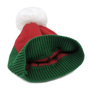 Classic festive Christmas knit beanie featuring red and green color-block with a pom-pom