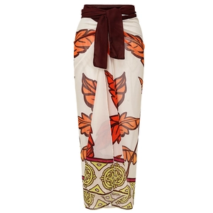 Matching cream sarong with orange leaf print and decorative waist ties for beachwear