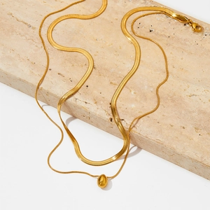 Double-layered gold stainless steel necklace with flat snake chain and oval drop pendant