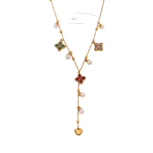 Gold-tone Y-shaped necklace with colorful clover pendants and white pearl beads