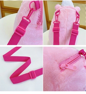 Detail view of pink plush backpack straps, sturdy plastic hooks and durable zippers