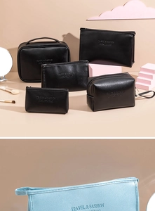 Black and light blue PU leather cosmetic bags in various sizes with Travel and Fashion print
