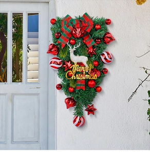Detail of Christmas teardrop swag with red ornaments, white reindeer and festive plaid bow