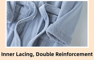 Detail view of the inner ties and double-thick fleece texture of the light blue bathrobe