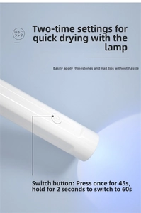 Detail of portable nail lamp showing white handheld design with 45s and 60s timer settings